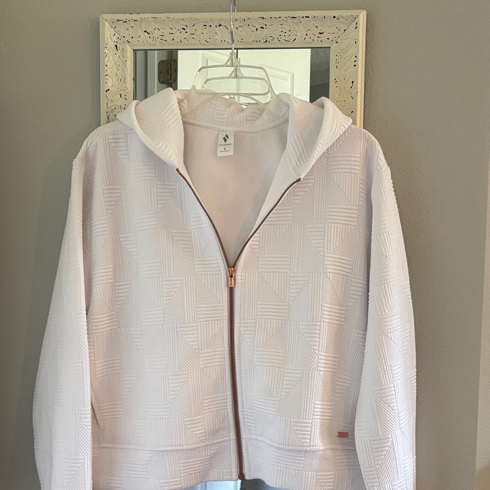Skechers white hooded ladies sweatshirt. $25 size L